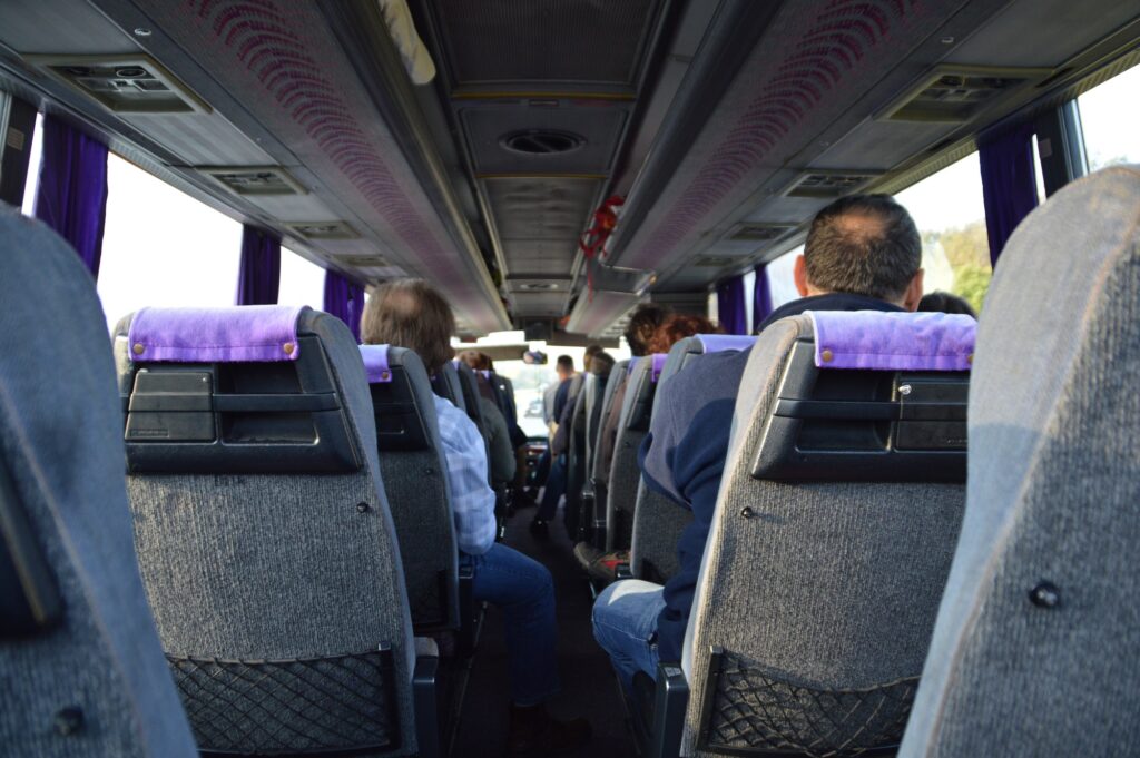 Rear view of passengers on the bus